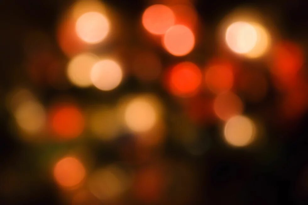 Abstract defocused lights on dark background