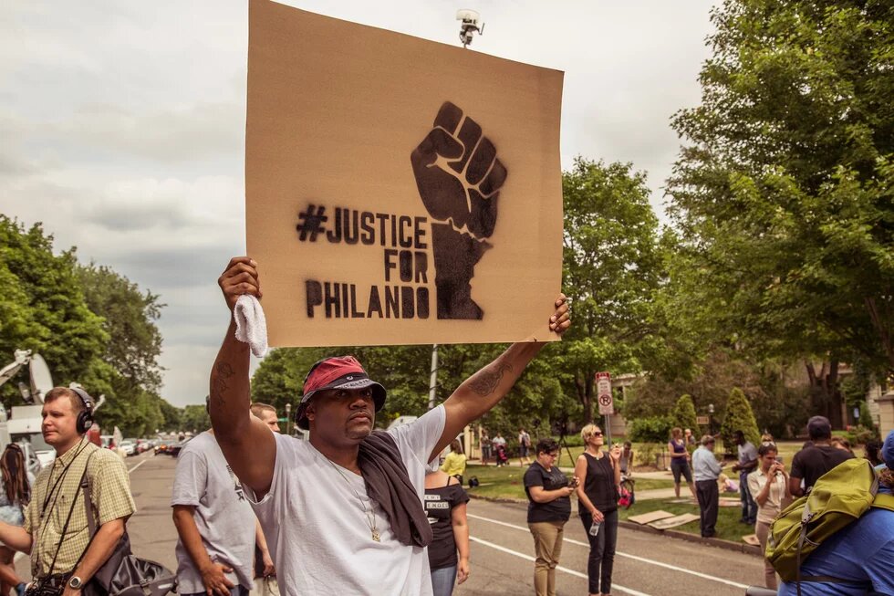 Following the police shooting death of Philando Castile, in Falcon Heights, Minnesota, community members march to the Governor’s mansion